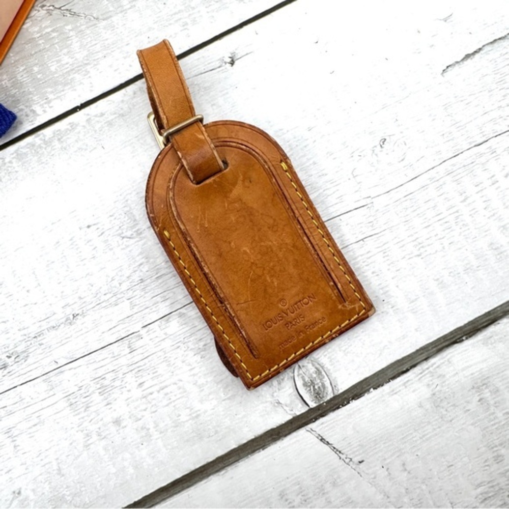 AUTHENTIC Vachetta Leather Luggage tag and loop.